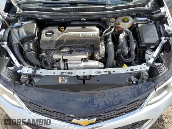 ✅ 2018 Chevrolet Cruze LS • VIN: 1G1BC5SM6J7197240 • Lot: 48868153. Listed on Copart with Not provided. Free auction sales archive from the USA and detailed vehicle history report at DreamBid. Image 12.