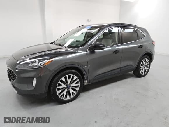 ✅ 2020 Ford Escape Titanium • VIN: 1FMCU9J90LUB20103 • Лот: 53809235. Опубликован ранее на Copart с пробегом 64 894 миль. Бесплатный доступ к архиву аукционных продаж из США и подробный отчёт об истории автомобиля на DreamBid. Изображение 1.