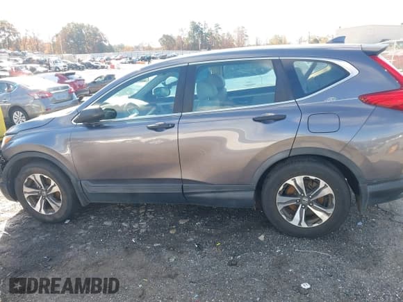 ✅ 2017 Honda CR-V LX • VIN: 5J6RW5H36HL004690 • Лот: 43655580. Опубликован ранее на IAAI с пробегом 63 596 миль. Бесплатный доступ к архиву аукционных продаж из США и подробный отчёт об истории автомобиля на DreamBid. Изображение 14.