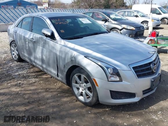 ✅ 2013 Cadillac ATS • VIN: 1G6AA5RX6D0176977 • Lot: 41822203. Listed on IAAI with 158,263 mi. Free auction sales archive from the USA and detailed vehicle history report at DreamBid. Image 1.