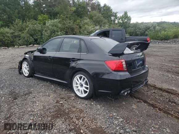 ✅ 2013 Subaru WRX WRX • VIN: JF1GV7F6XDG013619 • Lot: 68992015. Listed on Copart with 141,795 mi. Free auction sales archive from the USA and detailed vehicle history report at DreamBid. Image 2.
