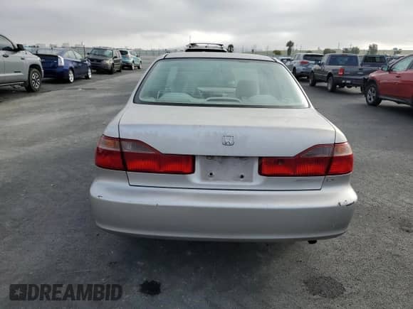 1999 Honda Accord LX z VIN 1HGCG6657XA150109, wystawiony jako Copart lot #85397155 z przebiegiem 132 685 mil mil oraz Szkoda całkowita • Salvage title. Historia ofert i sprzedaży dostępna na DreamBid. Obrazek 6.