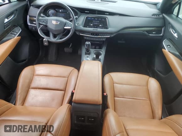 ✅ 2020 Cadillac XT4 FWD Premium Luxury • VIN: 1GYFZCR4XLF005029 • Лот: 55274025. Опубликован ранее на Copart с пробегом 50 550 миль. Бесплатный доступ к архиву аукционных продаж из США и подробный отчёт об истории автомобиля на DreamBid. Изображение 8.