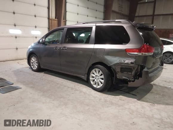 ✅ 2011 Toyota Sienna XLE • VIN: 5TDDK3DC8BS026606 • Lot: 41295760. Listed on IAAI with 128,930 mi. Free auction sales archive from the USA and detailed vehicle history report at DreamBid. Image 3.