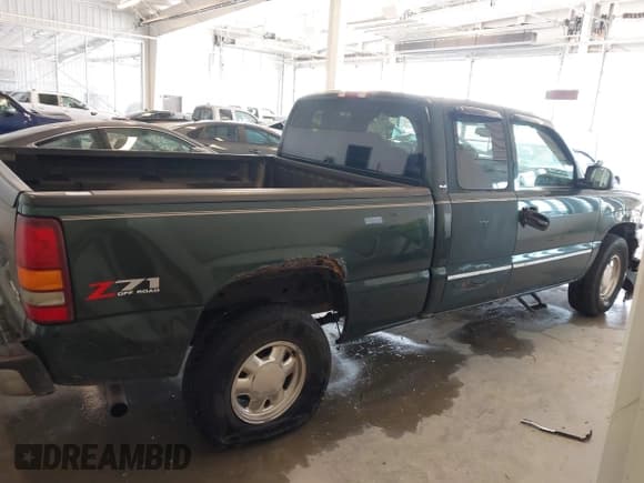 ✅ 2003 GMC Sierra 1500 SLT • VIN: 2GTEK19T531227955 • Lot: 43667157. Listed on IAAI with 320,993 mi. Free auction sales archive from the USA and detailed vehicle history report at DreamBid. Image 13.