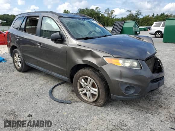 2012 Hyundai Santa Fe GLS с VIN 5XYZG3AB7CG145877, выставлен на аукционе Copart как лот 71986394 с пробегом Не указан миль и На запчасти • Non repairable. История ставок и продаж доступна на DreamBid. Изображение 4.