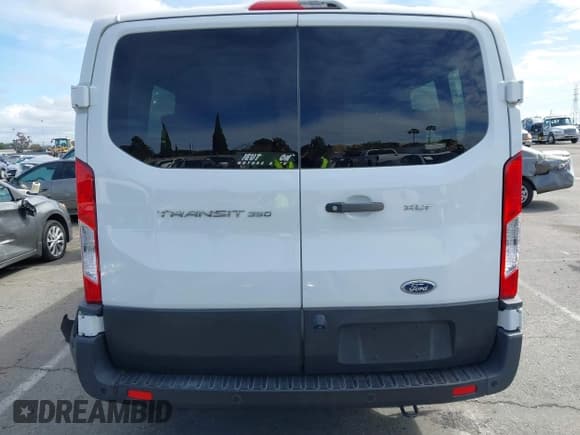 ✅ 2021 Ford Transit Passenger XL • VIN: 1FBAX2Y88MKA15155 • Lot: 41730982. Listed on IAAI with 70,357 mi. Free auction sales archive from the USA and detailed vehicle history report at DreamBid. Image 16.