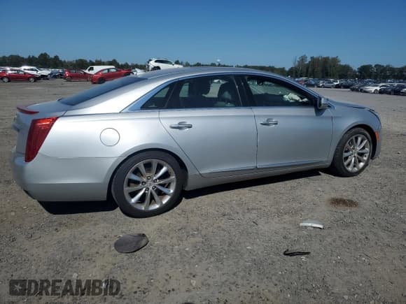 ✅ 2013 Cadillac XTS Premium • VIN: 2G61S5S30D9107423 • Лот: 80548835. Опубликован ранее на Copart с пробегом 168 992 миль. Бесплатный доступ к архиву аукционных продаж из США и подробный отчёт об истории автомобиля на DreamBid. Изображение 3.
