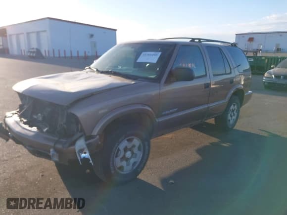 ✅ 2004 Chevrolet Blazer LS • VIN: 1GNDT13X74K143228 • Lot: 41761295. Wystawiony na IAAI z przebiegiem 149 003 mil. Bezpłatny archiwum sprzedaży aukcyjnych z USA i szczegółowy raport historii pojazdu na DreamBid. Zdjęcie 2.