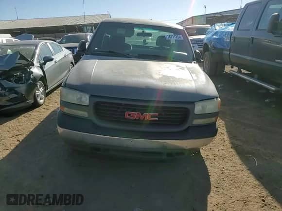 2002 GMC Sierra 1500 z VIN 1GTEC14W92Z280310, wystawiony jako Copart lot #74731204 z przebiegiem 241 075 mil mil oraz Szkoda całkowita • Salvage title. Historia ofert i sprzedaży dostępna na DreamBid. Obrazek 11.