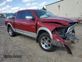 ✅ 2009 Dodge 1500 Laramie • VIN: 1D3HV13T39J502841 • Lot: 57079625. Wystawiony na Copart z przebiegiem 99 130 mil. Bezpłatny archiwum sprzedaży aukcyjnych z USA i szczegółowy raport historii pojazdu na DreamBid. Zdjęcie 4.