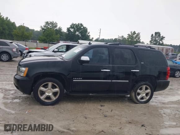 ✅ 2011 Chevrolet Tahoe LTZ • VIN: 1GNSCCE00BR206838 • Lot: 42854734. Listed on IAAI with 266,312 mi. Free auction sales archive from the USA and detailed vehicle history report at DreamBid. Image 14.
