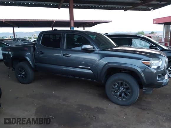 ✅ 2023 Toyota Tacoma SR5 • VIN: 3TMAZ5CN6PM199982 • Lot: 43087053. Listed on IAAI with 38,883 mi. Free auction sales archive from the USA and detailed vehicle history report at DreamBid. Image 13.