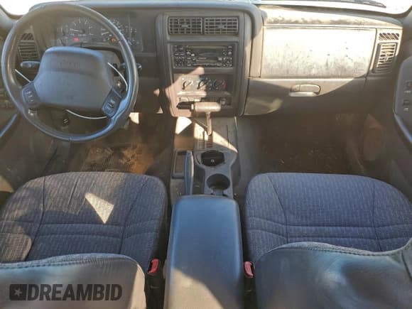 ✅ 2001 Jeep Cherokee Sport • VIN: 1J4FT48S21L614170 • Lot: 94708945. Listed on Copart with 173,209 mi. Free auction sales archive from the USA and detailed vehicle history report at DreamBid. Image 8.