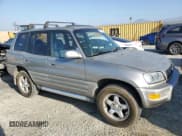 ✅ 2000 Toyota RAV4 • VIN: JT3GP10V0Y7066258 • Лот: 72776334. Опубликован ранее на Copart с пробегом 228 243 миль. Бесплатный доступ к архиву аукционных продаж из США и подробный отчёт об истории автомобиля на DreamBid. Изображение 4.
