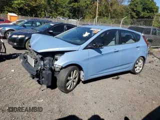 2012 Hyundai Accent SE with VIN KMHCU5AE9CU020586, listed as a Copart auction lot 87009485 with 194,002 mi miles and Salvage title. Bid and sale history available at DreamBid. Image 1.