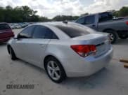 ✅ 2015 Chevrolet Cruze LT • VIN: 1G1PE5SBXF7150878 • Lot: 42226563. Listed on Copart with 129,999 mi. Free auction sales archive from the USA and detailed vehicle history report at DreamBid. Image 2.