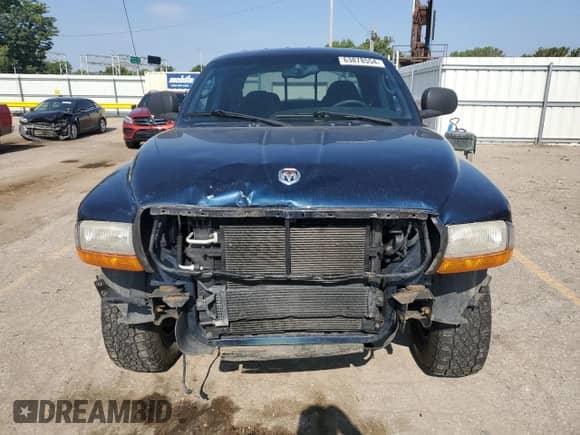 2000 Dodge Dakota Sport z VIN 1B7GG2AN8YS665678, wystawiony jako Copart lot #63878554 z przebiegiem 92 470 mil mil oraz Szkoda całkowita • Salvage title. Historia ofert i sprzedaży dostępna na DreamBid. Obrazek 5.