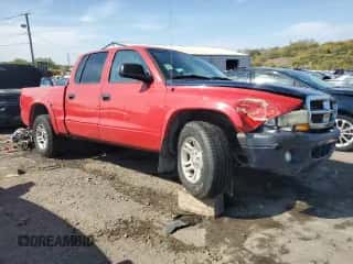 2003 Dodge Dakota Sport z VIN 1D7HL38NX3S222930, wystawiony jako Copart lot #71812234 z przebiegiem 203 140 mil mil oraz Szkoda całkowita • Salvage title. Historia ofert i sprzedaży dostępna na DreamBid. Obrazek 4.