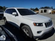 ✅ 2014 Jeep Grand Cherokee Laredo • VIN: 1C4RJEAG6EC157700 • Lot: 87287025. Listed on Copart with 183,330 mi. Free auction sales archive from the USA and detailed vehicle history report at DreamBid. Image 4.