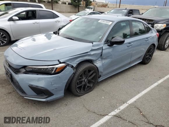 ✅ 2023 Honda Civic Sport • VIN: 2HGFE2F57PH513098 • Lot: 93902855. Listed on Copart with 65,129 mi. Free auction sales archive from the USA and detailed vehicle history report at DreamBid. Image 1.