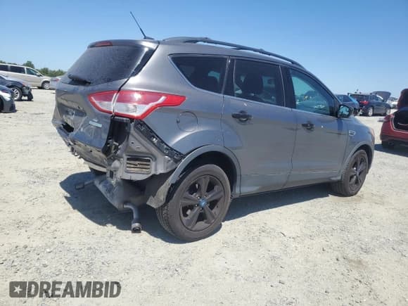 ✅ 2013 Ford Escape SE • VIN: 1FMCU0GX8DUB97112 • Lot: 61491835. Listed on Copart with 73,216 mi. Free auction sales archive from the USA and detailed vehicle history report at DreamBid. Image 3.