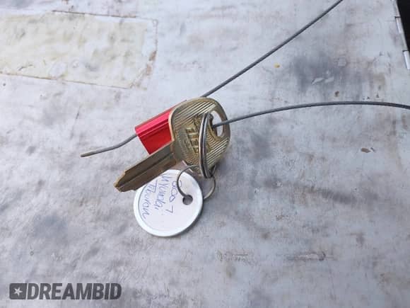 2007 Hyundai Tiburon GT z VIN KMHHN66F37U250320, wystawiony jako IAAI lot #42047654 z przebiegiem 231 899 mil mil oraz . Historia ofert i sprzedaży dostępna na DreamBid. Obrazek 11.