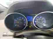 2013 Hyundai Tucson GLS z VIN KM8JUCACXDU758568, wystawiony jako Copart lot #72167974 z przebiegiem 188 013 mil mil oraz Szkoda całkowita • Salvage title. Historia ofert i sprzedaży dostępna na DreamBid. Obrazek 9.