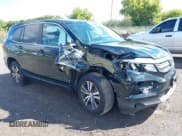 ✅ 2017 Honda Pilot EX-L • VIN: 5FNYF6H59HB091514 • Lot: 43083784. Listed on IAAI with 97,606 mi. Free auction sales archive from the USA and detailed vehicle history report at DreamBid. Image 1.