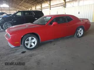 2012 Dodge Challenger SXT z VIN 2C3CDYAG1CH291382, wystawiony jako Copart lot #82009895 z przebiegiem 145 162 mil mil oraz Szkoda całkowita • Salvage title. Historia ofert i sprzedaży dostępna na DreamBid. Obrazek 1.