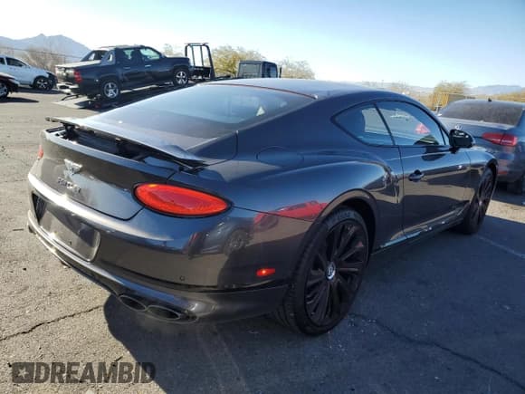 ✅ 2022 Bentley Continental GT GT V8 • VIN: SCBCG2ZG7NC002194 • Lot: 87942625. Listed on Copart with 13,432 mi. Free auction sales archive from the USA and detailed vehicle history report at DreamBid. Image 3.