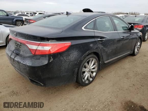 2013 Hyundai Azera с VIN KMHFH4JG6DA233074, выставлен на аукционе Copart как лот 87653725 с пробегом 150 481 миль миль и Списание • Salvage title. История ставок и продаж доступна на DreamBid. Изображение 3.