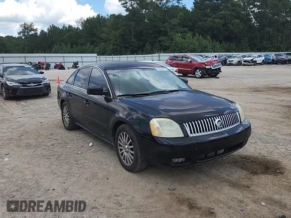 ✅ 2005 Mercury Montego Premier • VIN: 1MEFM43195G605951 • Лот: 62866455. Опубликован ранее на Copart с пробегом 309 706 миль. Бесплатный доступ к архиву аукционных продаж из США и подробный отчёт об истории автомобиля на DreamBid. Изображение 13.