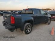 ✅ 2020 Chevrolet Colorado 2WD Z71 • VIN: 1GCGSDEN4L1135341 • Лот: 77398214. Опубликован ранее на Copart с пробегом 57 079 миль. Бесплатный доступ к архиву аукционных продаж из США и подробный отчёт об истории автомобиля на DreamBid. Изображение 3.