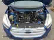 2018 Ford Escape SE z VIN 1FMCU9GD7JUA05961, wystawiony jako Copart lot #82458805 z przebiegiem Nie podano mil oraz Czysty tytuł • Clean title. Historia ofert i sprzedaży dostępna na DreamBid. Obrazek 12.