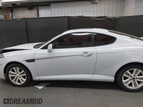 2008 Hyundai Tiburon GS с VIN KMHHM66D98U280005, выставлен на аукционе IAAI как лот 42580014 с пробегом 267 858 миль миль и . История ставок и продаж доступна на DreamBid. Изображение 14.
