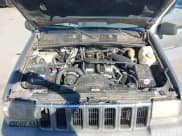 ✅ 1998 Jeep Grand Cherokee Laredo • VIN: 1J4FX58S9WC304258 • Lot: 43603048. Listed on IAAI with 232,555 mi. Free auction sales archive from the USA and detailed vehicle history report at DreamBid. Image 10.