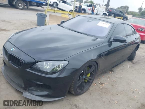 ✅ 2014 BMW M6 • VIN: WBS6C9C57ED467275 • Lot: 42787711. Listed on IAAI with 105,158 mi. Free auction sales archive from the USA and detailed vehicle history report at DreamBid. Image 2.
