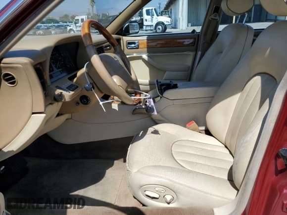 ✅ 1995 Jaguar XJ • VIN: SAJKX1744SC720830 • Lot: 69212295. Listed on Copart with 77,847 mi. Free auction sales archive from the USA and detailed vehicle history report at DreamBid. Image 7.