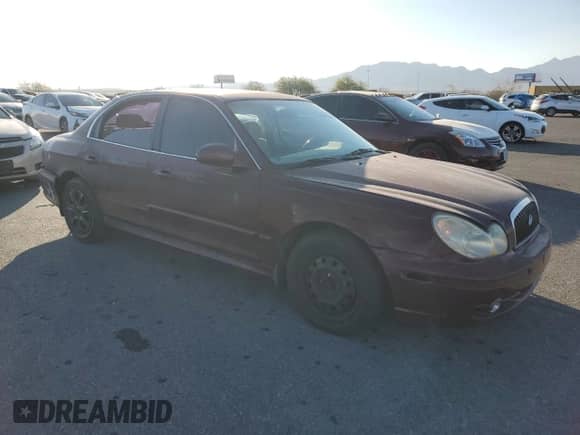 2002 Hyundai Sonata с VIN KMHWF25S12A577255, выставлен на аукционе Copart как лот 80964404 с пробегом 161 953 миль миль и Списание • Salvage title. История ставок и продаж доступна на DreamBid. Изображение 4.