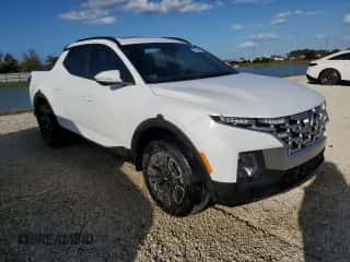 2022 Hyundai Santa Cruz SEL Premium z VIN 5NTJDDAF8NH037411, wystawiony jako Copart lot #75353154 z przebiegiem 9 656 mil mil oraz Nie do naprawy • Non repairable. Historia ofert i sprzedaży dostępna na DreamBid. Obrazek 4.