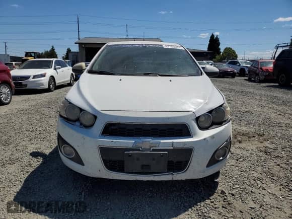 2014 Chevrolet Sonic LTZ с VIN 1G1JE5SG0E4123626, выставлен на аукционе Copart как лот 61103254 с пробегом 158 390 миль миль и Списание • Salvage title. История ставок и продаж доступна на DreamBid. Изображение 5.