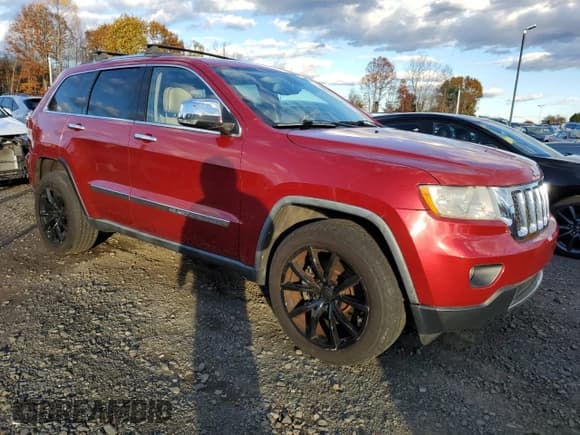 ✅ 2011 Jeep Grand Cherokee Overland • VIN: 1J4RR6GT7BC541784 • Lot: 90932835. Listed on Copart with 125,575 mi. Free auction sales archive from the USA and detailed vehicle history report at DreamBid. Image 4.