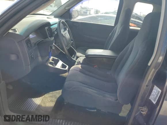 2002 Dodge Dakota z VIN 1B7GG32X42S696990, wystawiony jako Copart lot #76347504 z przebiegiem 226 883 mil mil oraz Szkoda całkowita • Salvage title. Historia ofert i sprzedaży dostępna na DreamBid. Obrazek 7.