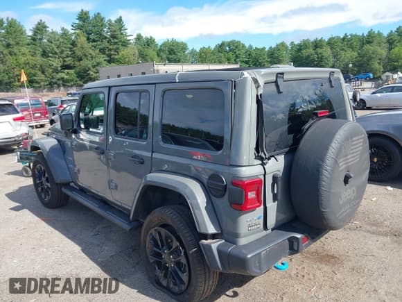 ✅ 2023 Jeep Wrangler Sahara • VIN: 1C4JJXP64PW568165 • Lot: 42740617. Listed on IAAI with 86,559 mi. Free auction sales archive from the USA and detailed vehicle history report at DreamBid. Image 3.