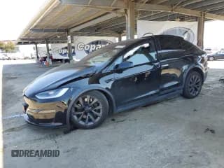 ✅ 2023 Tesla Model X • VIN: 7SAXCDE57PF421472 • Lot: 61857915. Wystawiony na Copart z przebiegiem Nie podano. Bezpłatny archiwum sprzedaży aukcyjnych z USA i szczegółowy raport historii pojazdu na DreamBid. Zdjęcie 1.