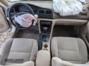 ✅ 1999 Mazda 626 ES • VIN: 1YVGF22C9X5887587 • Лот: 46346305. Опубликован ранее на Copart с пробегом 92 715 миль. Бесплатный доступ к архиву аукционных продаж из США и подробный отчёт об истории автомобиля на DreamBid. Изображение 8.