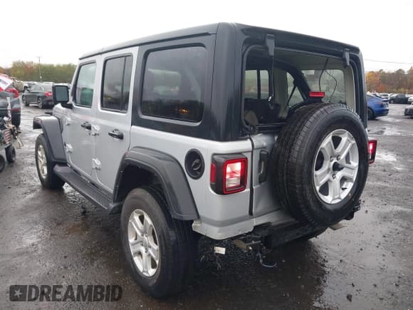 ✅ 2022 Jeep Wrangler Unlimited Sport S • VIN: 1C4HJXDG3NW132089 • Lot: 43575037. Listed on IAAI with 64,052 mi. Free auction sales archive from the USA and detailed vehicle history report at DreamBid. Image 6.