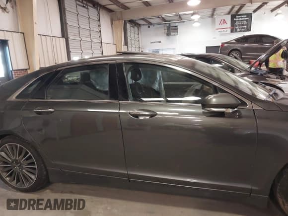 ✅ 2016 Lincoln MKZ Hybrid • VIN: 3LN6L2LU7GR602024 • Lot: 41224915. Wystawiony na IAAI z przebiegiem 176 538 mil. Bezpłatny archiwum sprzedaży aukcyjnych z USA i szczegółowy raport historii pojazdu na DreamBid. Zdjęcie 13.