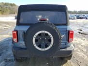 ✅ 2023 Ford Bronco • VIN: 1FMEE5DP0PLB17111 • Лот: 86588374. Опубликован ранее на Copart с пробегом 26 093 миль. Бесплатный доступ к архиву аукционных продаж из США и подробный отчёт об истории автомобиля на DreamBid. Изображение 6.